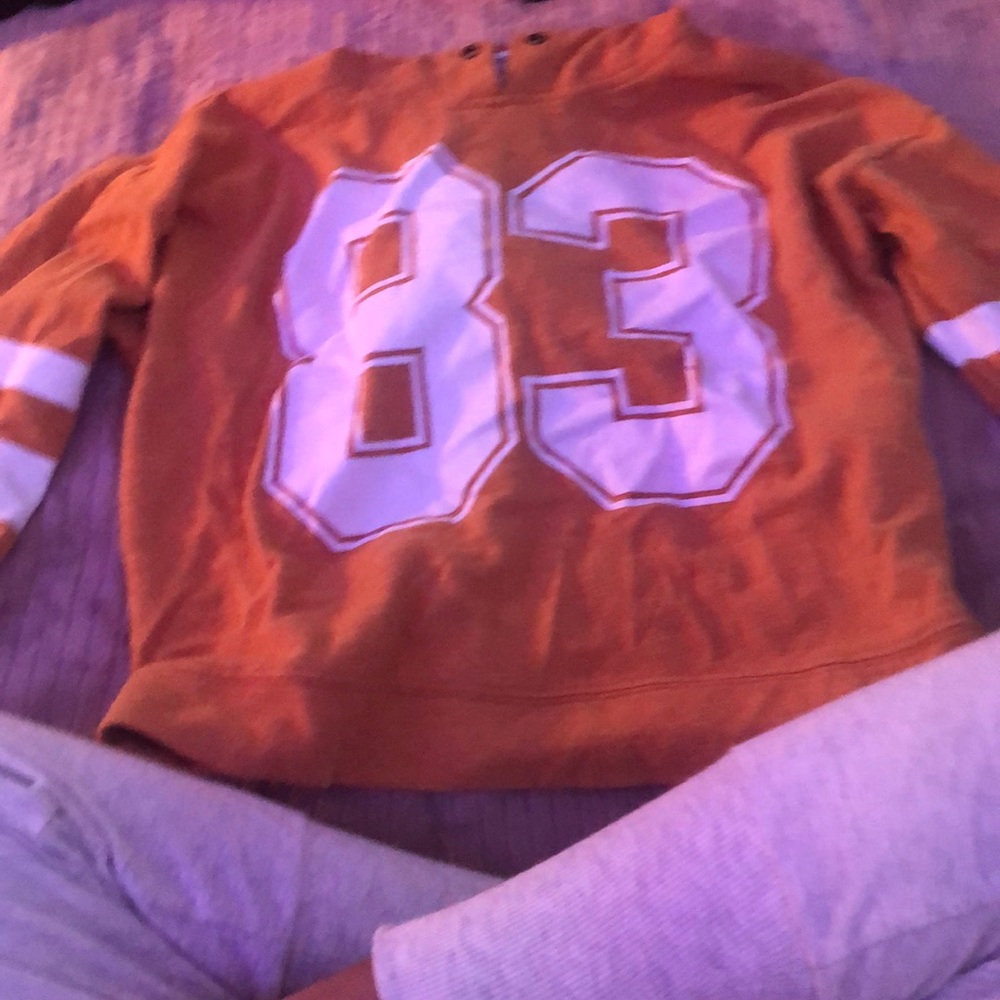 Orange long sleeve with hoodie.